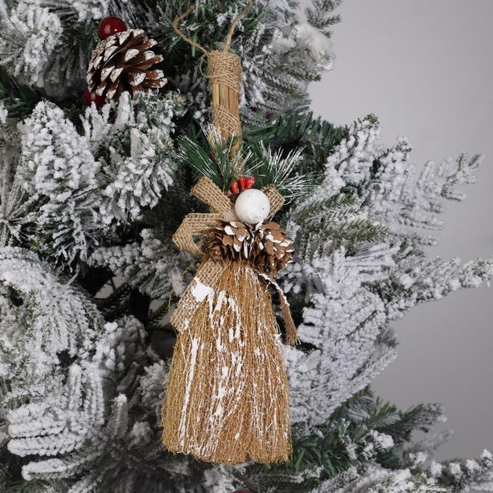 Broom toy with golden text Merry Christmas. New Year Card