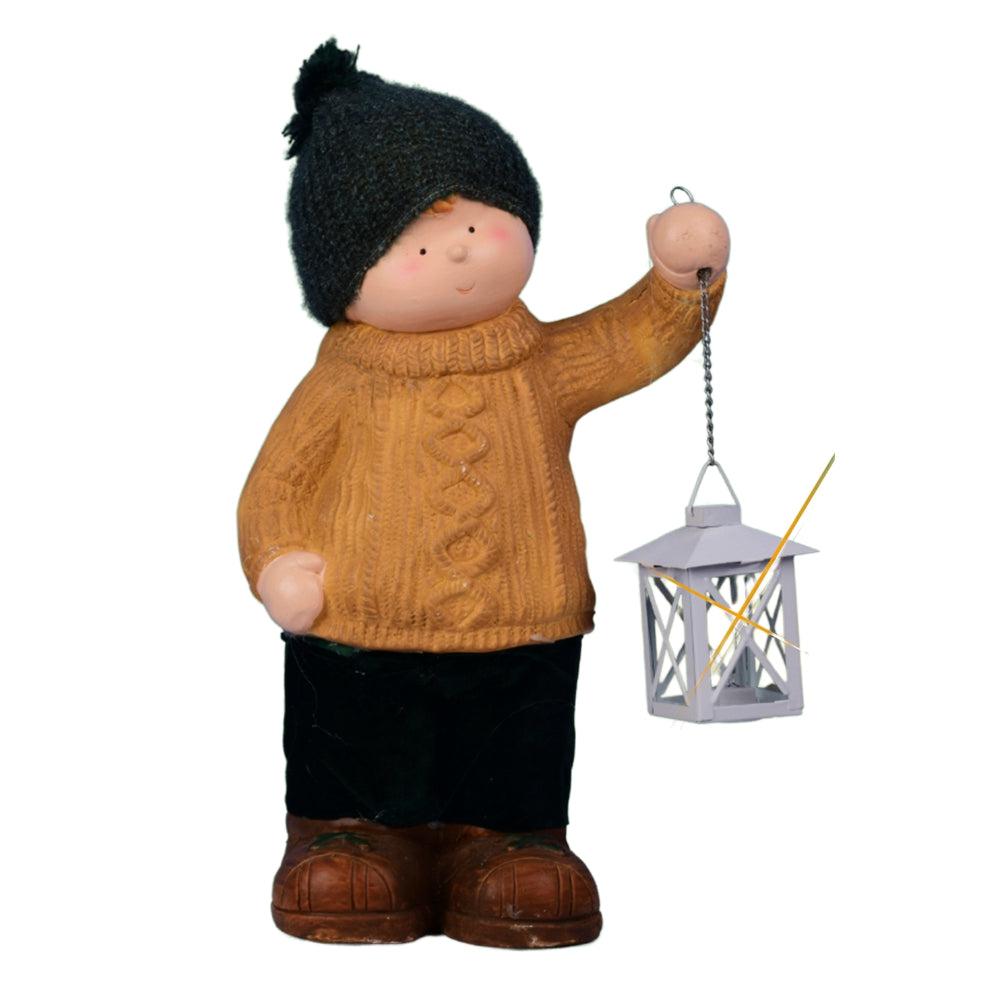 Charming Boy Holding A Candle Latern