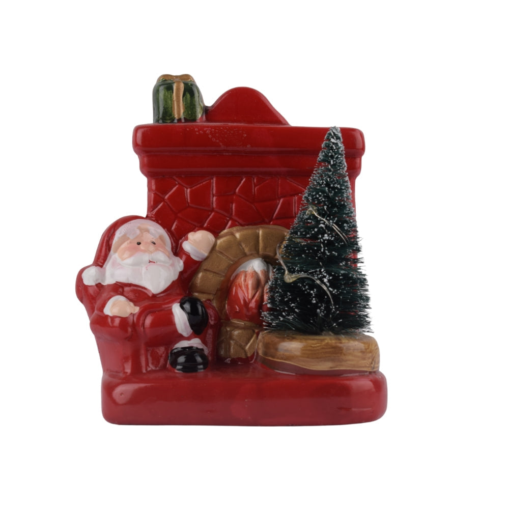 Santa Claus by the Fireplace Christmas Figurine